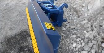 Heavy duty wheel loader / skid steer snow blade / snow plow / hydraulic angle blade. Manufactured by Tysea mfg inc. Optional bolt on serrated or smooth cutting edge.